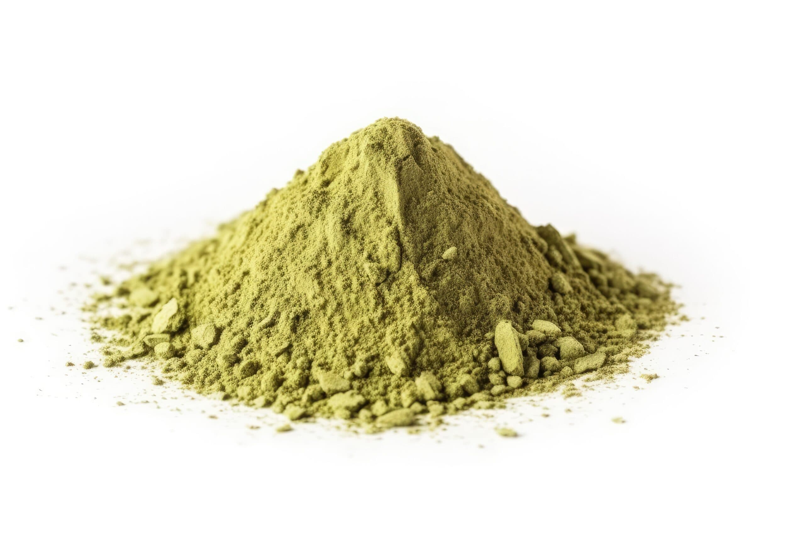 Natural green matcha powder on a white background.